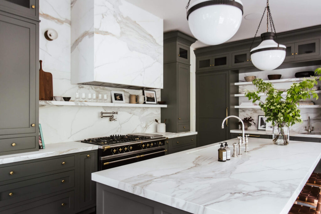 grey cabinets and marble countertops in main kitchen